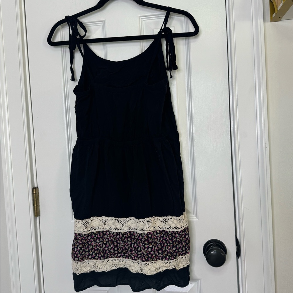 Dejavu Black Dress with Lace and Floral Accent - Picture 6 of 8